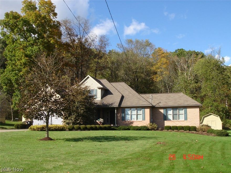 Beautiful custom built home. Large living room with gas fireplace, equipped eat in kitchen, formal dining room, laundry room, half bath and sun room. First floor master suite with two walk in closets and bath. Den with custom oak built ins. Upper level with two bedrooms and full bath.  Central vacuum with attachments on each floor. Water softener with reverse osmosis system. New hot water tank.  200 amp service. Full basement. Two car garage. Beautifully landscaped lot.  Situated on a cul-de-sac dead end street.