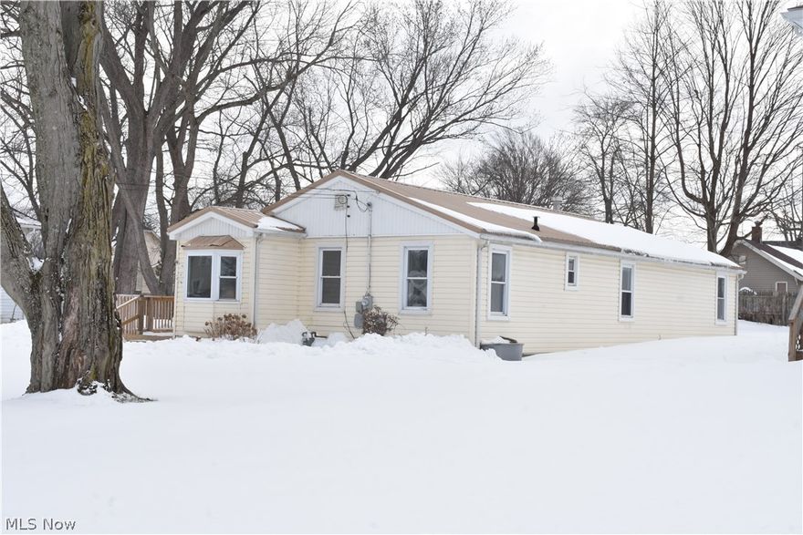 Move-in-ready ranch home recently remodeled & ready for your personal touches! Affordable 1-floor living with some great features to help make it extremely low maintenance, such as the newer metal roof, & all newer interior flooring and paint, including luxury vinyl plank in the large eat-in kitchen, & living room. This home is also vinyl sided with gas forced air heat and central air. The full bathroom offers a tub/shower combo with beautiful tile work & an updated vanity. The master bedroom features a private half bathroom and a large closet. There's a nice sized storage shed and multiple decks outside.