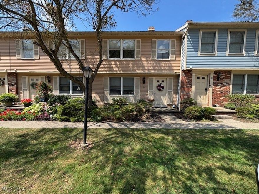 Welcome to low-maintenance living in the desirable Quaker Ridge community within the Copley-Fairlawn School District! This well-maintained 2-story condo offers 2 generously sized bedrooms, 1.5 baths, and an attached 1-car garage.

Recent updates in July 2025 include a new sliding patio door, a stylish new vanity in the main bath, and a full suite of stainless steel kitchen appliances—making this home truly move-in ready. The main floor features a bright, open layout where the living and dining areas flow seamlessly together, with a private deck just off the dining room for outdoor relaxation or entertaining.

Upstairs, you’ll find two spacious bedrooms, including a primary suite with a dressing area and walk-in closet. A full bath—featuring a shower/tub combination and new vanity—is also located on the second floor. A convenient half bath is on the main level. The finished, carpeted bonus room on the lower level—just off the back entry and garage—offers flexible space for a home office, mudroom, workout area, or hobby room.

For added comfort and efficiency, the furnace, A/C, and hot water tank were all replaced in 2018. The $275/month HOA fee covers association insurance, exterior maintenance, snow removal, trash service, and a reserve fund—making for truly carefree living.

Ideally located near shopping, dining, parks, and major highways, this home combines comfort, convenience, and a welcoming community setting.