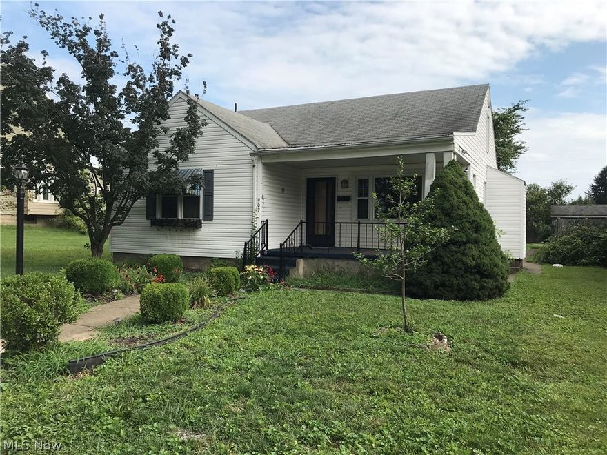 2 Bedroom bungalow with full basement and covered front porch, hardwood under carpet, decorative fireplace in living room, room on 2nd floor being used as a third bedroom with 1/2 bath. This is an impacted property.