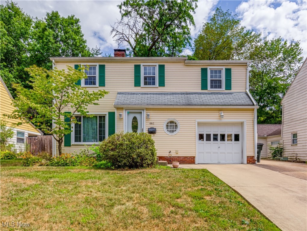 Welcome to this charming Colonial featuring 3 bedrooms, 1.5 baths, and a convenient 1-car attached garage. An inviting living room with gleaming hardwood flooring and a cozy fireplace greet you. The formal dining room, accented with a chandelier and direct access to the backyard, is perfect for gatherings. The eat-in kitchen offers ample storage, while a convenient half bath completes the main floor. Upstairs, you’ll find three generous-sized bedrooms, two with beautiful hardwood floors, along with a full bath. The lower level provides a spacious open area ideal for a recreation room, workout space, or whatever suits your lifestyle. Outdoors, enjoy a private fenced-in yard complete with a patio, shed, and a covered, screened-in porch perfect for relaxing or entertaining without the bugs. This home blends comfort, functionality, and charm, making it a must-see!
