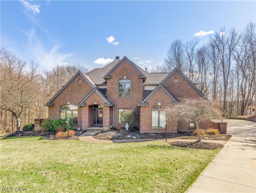 LOT: 136 X100 X243 Beautifully maintained 4 possible 5 bedroom brick colonial. Granite counters throughout the spacious applianced kitchen with loads of counter space and cabinets great for entertaining or for making favorite meals. The eating area opens to a large deck. The gas fireplace can be enjoyed when you're in the kitchen or family room. Marble floors in the formal living room and the hall on the second floor.  Spacious master bedroom with walk-in closet and bath with jacuzzi, double sink and walk-in shower.  The basement recreation room is beautifully done with ceramic floors and French doors that open to a patio with a fire pit for Fall evenings plus a covered patio area for outdoor barbecues and entertaining. The 13 x 20 room in the lower level marked as other can be what you want it to be. It has carpet meant for a workout room. Two car attached garage with new insulated doors and openers 2022.  New roof 2018 and new gutters 2021. Home warranty included.