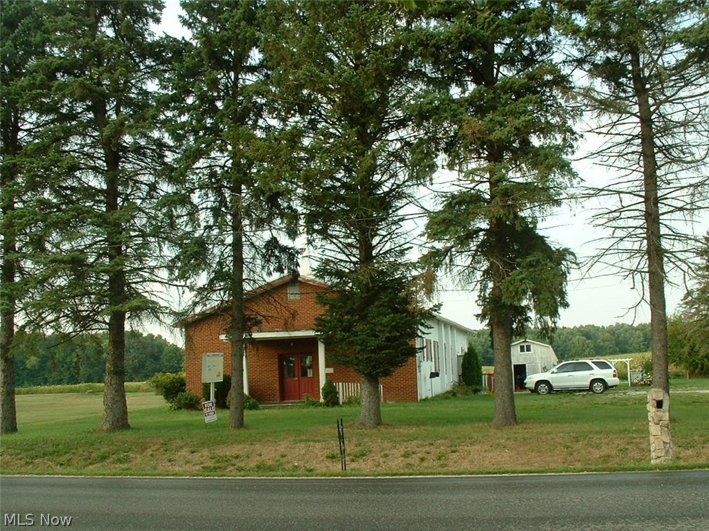 What a great price for .688 acres right on the edge of town with city services AND a block country church. The roof was replaced (total tearoff) in 2010. The building has a men's and a women's bathroom, three small rooms, a foyer, sanctuary, a newer furnace, some replacement windows, 14 oak pew benches, pulpit, organ, piano, 10 ceiling fans and miscellaneous items. In addition, there is an 18 x 28 picnic pavilion (built in '89) and a 14 x 16 storage barn (built in '96) with some personal property yet to be removed. When the property was built, a conditional use permit was granted, with a provision should it not be used as a church for a period of 12 or months, the zoning would revert to SF. Inasmuch as the property now falls within that time line, if the intended use is a church, a reapplication will need to be filed with the Village of Creston.
