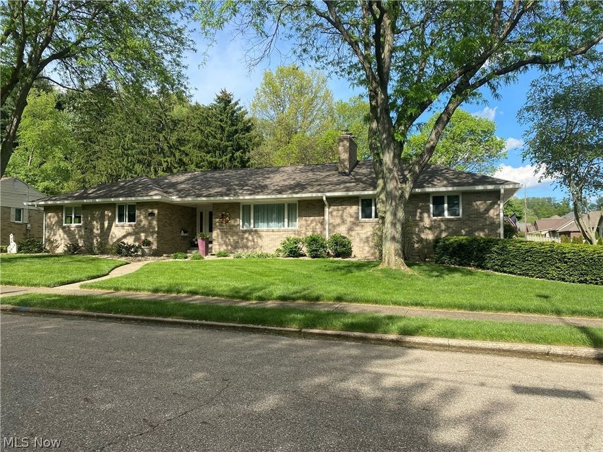 Beautiful all brick ranch with 2-3 bedrooms, 3 full baths.  Brick wood burning fireplace in the living room.  Kraftmaid oak kitchen with Corian counters and built-in pantry.  French doors in the family room lead to the 24 X 20 pavered patio.  Whirlpool tub in the guest bath.  His and hers walk in closets in the first floor master suite with full bath.  Finished, waterproofed lower level with bedroom, bath and rec room with brick fireplace.  Replacement windows throughout.  3 zoned heating system.  2 car attached garage.  Whole house generator.  New asphalt roof in 2013+/-.  Replaced gutters with gutter guard.  Inground, whole yard sprinkler system.  Nice North Dover location.
