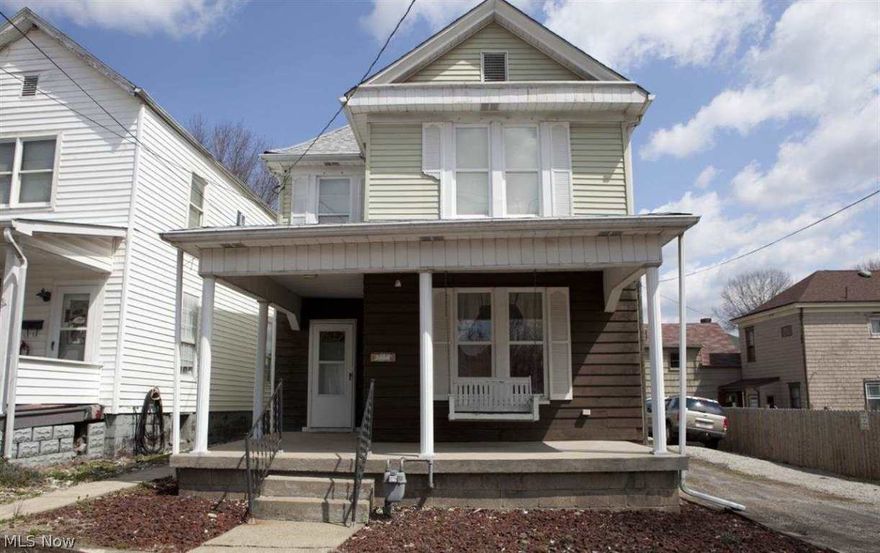 Two-story home with lots of character. Off street parking, front porch, back patio. Spacious rooms, arched doorways, awesome woodwork. Eat-in Kitchen, first floor laundry with half bath.