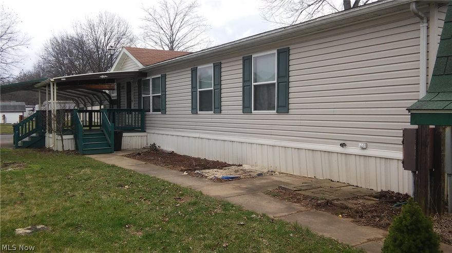 Spacious 3-4 bedroom manufactured home. 2-car carport leads to a nice size covered deck. Leads you into the open concept living room, dining room and kitchen. kitchen is set up for entertaining with an island and with plenty of cupboard space. Bonus room off of the master bedroom/kitchen could be an office, nursery or 4th bedroom. Master bedroom has a walk-in closet, master bath with garden tub and separate shower. Split layout with master at one end and 2 bedrooms with second full bath at the other end. Sky lights throughout give you plenty of natural light. Second deck off of the back. Storage building included.