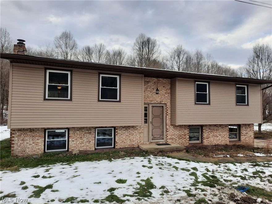 Imagine living in a like new house in the country yet close enough to nearby amenities of the city. Fully renovated from top to bottom with upgrades starting immediately as you walk through the front door with all new flooring and paint. All new cabinets throughout home from kitchen to bathrooms. Light fixtures with new LED style that brightly lights up your bedrooms and living area with a family and living room to entertain. New carpet throughout bedrooms and family room. Entertain your guests with a wood burning fireplace in the family room with an attached 2 car garage. Open floor plan that lets you entertain with an extended deck right off of the dining/kitchen through a DOUBLE sliding patio door overlooking your gorgeous back yard with a creek running through the rear of the property. Be the first to live in this newly renovated home.