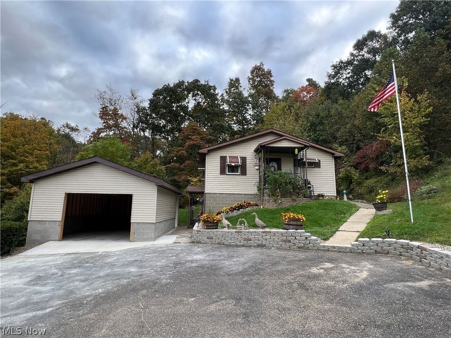 Peaceful country setting, just minutes from town.  2 bedroom vinyl sided ranch on 6+ acres.  Updated kitchen provides access to the 12 X 10 deck.  Walk out basement finished with rec room, mud room and laundry area.  Vinyl thermo replacement windows  200 amp electric.  120 gallon rented hot water heater.  New vinyl sided 24 X 18, 1.5 car detached garage.  2 storage buildings, 10 X 8 & 16 X 16.  The taxes reflect the seller receiving a homestead credit of $349.88 annually.  Don't miss this one!  Seller is retaining mineral rights.