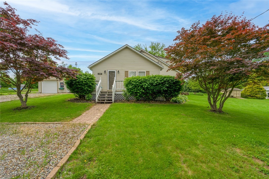 Welcome to this well-loved and meticulously maintained 3-bedroom Cape Cod, nestled on a .312-acre lot in peaceful Shalersville Township. From the moment you step onto the inviting front porch, you’ll feel the warmth and character this home has to offer.
Inside, you'll find a thoughtfully designed floor plan that maximizes every inch of space. The extra-large living room is perfect for gathering with family and friends, while the spacious eat-in kitchen offers plenty of room for meals and conversation. Closets and storage spaces are cleverly placed throughout, ensuring both functionality and convenience.
Enjoy outdoor living with multiple relaxing spaces including a covered back porch, a private backyard enclosed with a privacy fence, and a side paver patio—perfect for summer evenings and weekend barbecues. The large open side yard features a generous storage shed and offers additional room to play, garden, or expand.
A one-car garage adds practicality, and the overall charm of the home shines through in every corner. Whether you're a first-time buyer or looking to downsize without sacrificing comfort, this Cape Cod offers the perfect blend of charm, space, and quiet country living.
Don’t miss your opportunity to own this lovely gem—schedule your private showing today!
