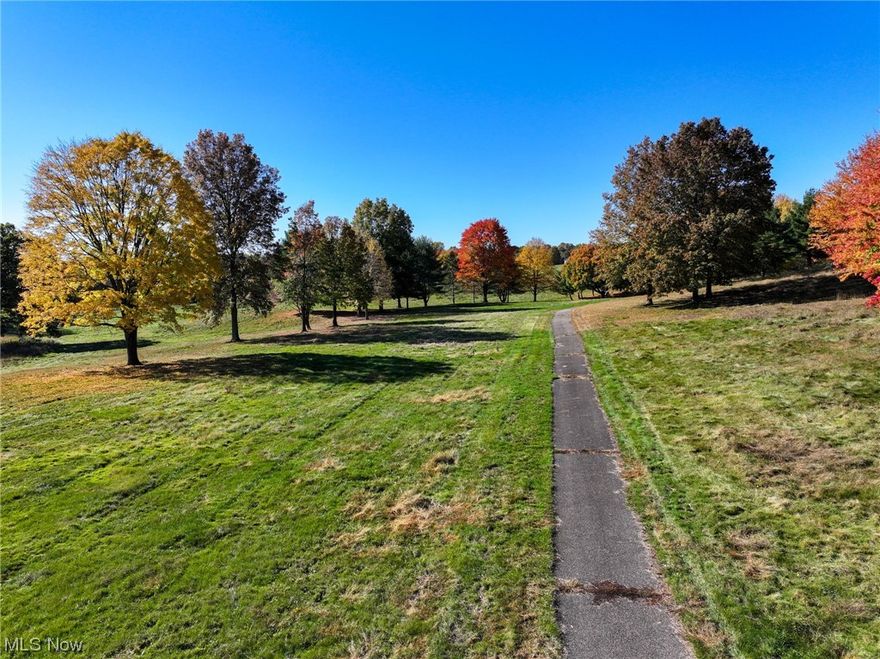 Parcel #6 - 20 acres Open Building Site with mature trees and 2 ponds. Shared common access easement 100' road frontage. The total offering is 159+ acres of lush greens and scenic landscapes, this formerly Seven Hills golf course is waiting to be rediscovered with an abundance of possibilities for potential buyers. Property will be offered in 10 individual parcels, or as a whole. Nestled amidst the natural beauty of Hartville, in northern Stark County, the property in its entirety not only boasts of picturesque building sites, but also includes a custom all-brick elaborate home, good club house with paved parking lot, and a large 40’x120’ shop with 40’x36’ and 40’x56’ additions. Onsite Auction with Online Bidding Available.