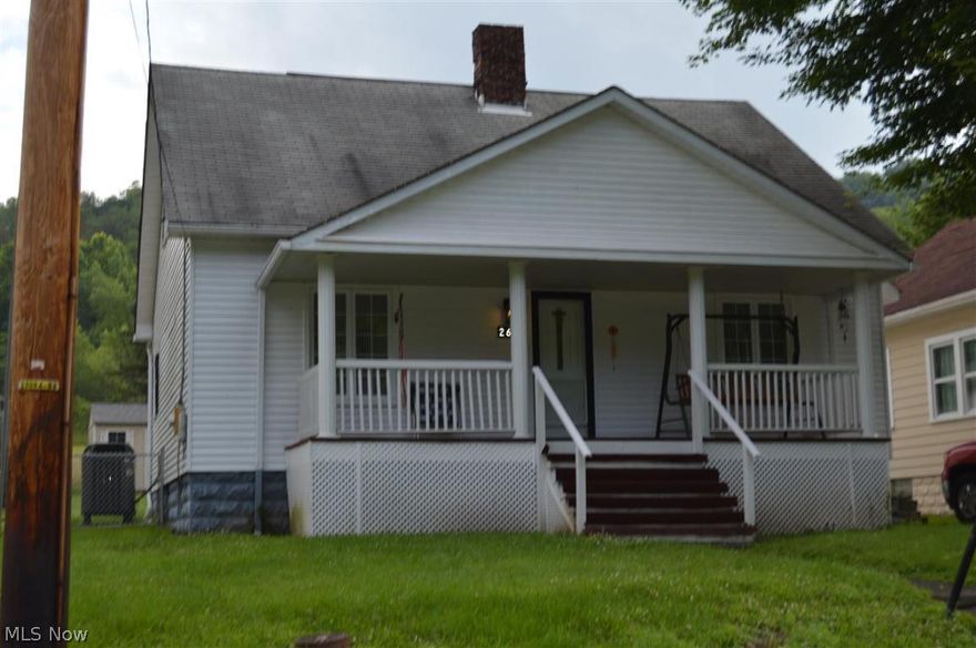 Nice 1 and a half story home with large serene front porch and great flat fenced yard. The home offers 3 bedrooms, 2 full baths, and a hug living room/dining combo. It also has a remodeled bath and remodeled kitchen with new granite countertops. Replacement windows, trane furnace, newer shingles, and newer carpets. Seller will convey mineral rights.