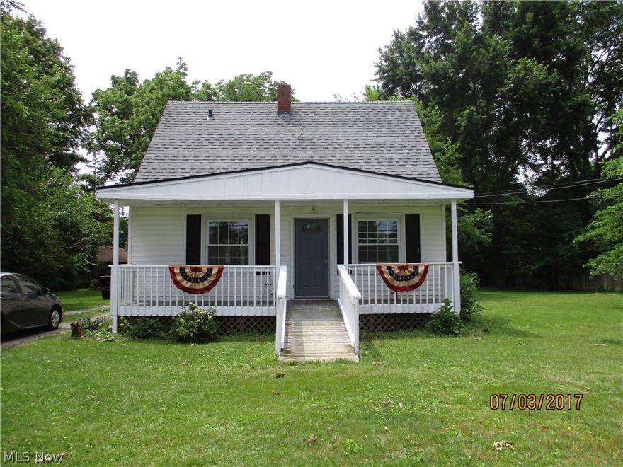Olmsted Falls schools!  Own a little bit of country in the city!  Neutral colors throughout & all carpeting just 1 year new!  Updated kitchen with newer oak cabinetry!  First floor laundry and a walk out basement!  254' frontage 1.3 acre lot includes the wooded area east of the home all the way to Station Road!  Privacy abounds year round!  Available for immediate occupancy!  Enjoy the front porch during the warmer months!  Loads of storage areas!  Move-in ready. New roof March 2017. Motivated seller will look at all reasonable offers. 254 ft. Frontage!