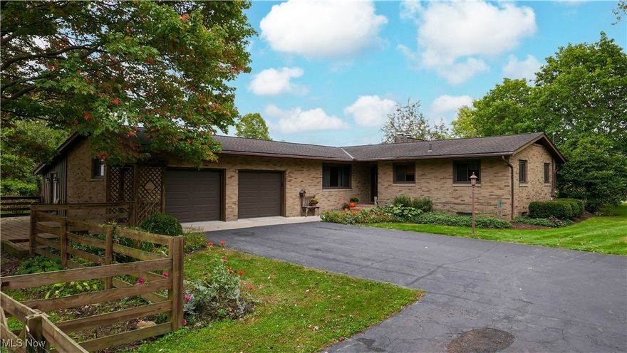 Quality built and well maintained. This 4 bedroom, 2 full bath, Ranch is settled on almost 2 acres. Sprawling and boating over 2,000 sq ft which includes a 4 season room over looking the back yard.Ceramic tile and wood floors. Just minutes from Hartville off Pontius Rd. Large finished lower level includes a workshop and plenty of storage. The home is wired for and generator ready. Side yard is fenced in, perfect for small children and/or pets. One floor living at its finest. Come take a look today!