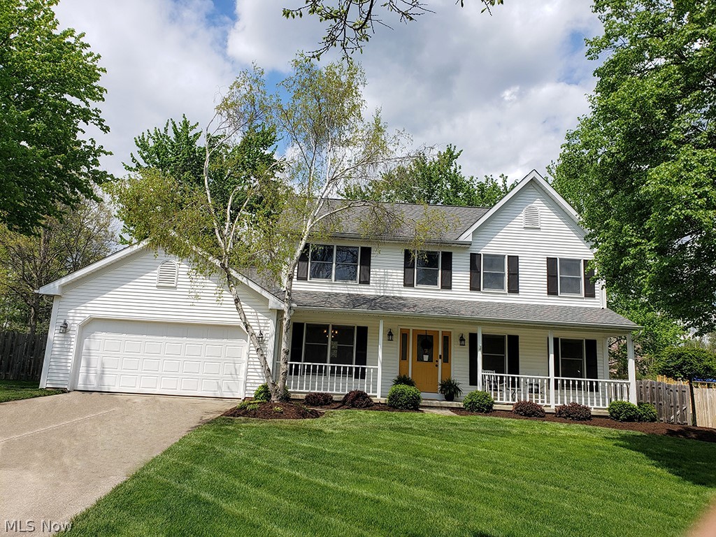 Welcome Home! This gorgeous 4br Colonial home in the desirable Forest Meadows neighborhood is sure to WOW you. Large front porch with bright freshly painted door invites your guests to come inside . The entry features hardwood flooring, a guest closet and plenty of room for an entry table. Professionally installed Bruce hardwood flooring throughout most of the first floor. Large eat-in kitchen features brand new granite counters, updated light fixtures, handsome black appliances (brand new stove), and opens to the family room w/ wood burning fireplace. Family room and front room are separated by French doors. Front room has brand new built in work stations and could truly be anything you desire... playroom, living room, home office or home school area. Dining room is just off the kitchen opposite front room. Down the hall from the kitchen is the half bath, first floor laundry and garage entry. Owners suite features hardwood floors), soaking tub, double sink vanity, skylight, walk in cl
