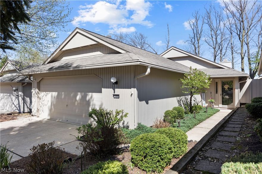 Ready for easy living in a serene and peaceful 55+ community, this rare offering combines comfort, convenience, and exceptional amenities. Residents enjoy access to an indoor heated pool, exercise room, sauna, gathering area, library, and scenic walking paths surrounded by natural beauty and local wildlife.

Built by Bob Schmitt, this limited-maintenance community features detached, single-story homes designed for effortless living. The thoughtfully designed floor plan offers over 1,900 square feet and includes 2 bedrooms and 2 full baths. The open great room is anchored by a wood-burning, brick-front fireplace with built-in bookshelves, creating a warm and inviting focal point. Expansive floor-to-ceiling windows fill the space with natural light and provide views of the private courtyard. An additional family room offers flexible living space to suit a variety of needs.

The eat-in kitchen provides ample storage, making downsizing optional. The spacious primary suite features dual walk-in closets, a walk-in shower, and dual sinks. Neutral décor throughout creates a clean, move-in-ready environment adaptable to any style.

Additional highlights include newer vinyl plank flooring, an epoxy-coated garage floor, and an attached two-car garage with extra storage. The private, enclosed courtyard has been recently refreshed with new stone and plantings, offering an ideal space for relaxation or pets.  Call today for your own private showing.