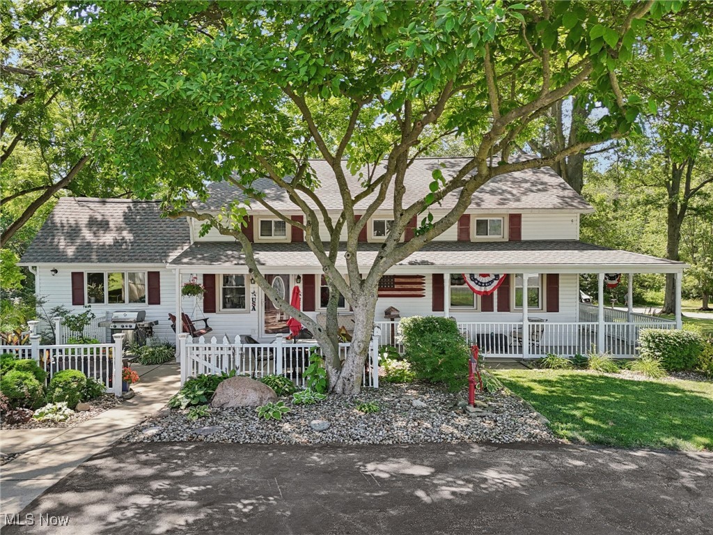 NEW PRICE and motivated Seller for this GORGEOUS COUNTRY OASIS!! Take the road less traveled and relax to the sounds of nature while soaking in the views of over 7 rolling acres of mature trees, a meandering creek, and a beautiful, stocked pond. You'll love the ambiance and hunting lodge feel of this historical 1800's home. Solidly built and very well maintained with updates including newer zoned HVAC, electric, water lines, insulation, windows and roof. Featuring a remodeled interior with custom finishes throughout. The Kitchen boasts a vaulted ceiling, stainless appliances, custom cabinets and views to the scenic backyard. The Gathering Room has a stone fireplace, wet bar for entertaining and walls of windows overlooking a multi-tiered deck with hot tub and stamped concrete patio. Very large heated/cooled 3+ car garage with shop area and work benches. Three additional outbuildings (50 x 110) (40 x 48) (30 x 16) with water and electric, great for boat/RV storage, horse farm or home business. Also featuring NATURAL GAS and rural water, plus a working well. Ask about an additional 3.4 wooded acres available! This is a rare opportunity to own a property with character and history in such a beautiful, peaceful setting! Agent has a business relationship with the Seller.
