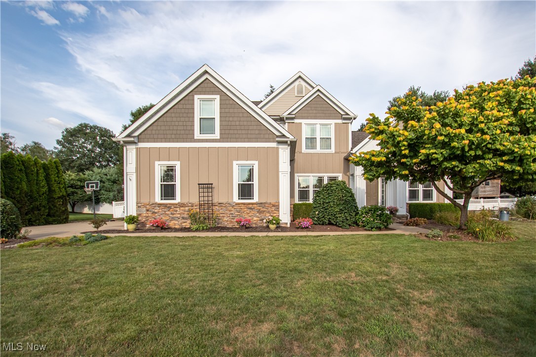 Welcome home to this beautifully maintained 5-bed, 3-bath colonial nestled in the heart of Massillon & part of the Jackson School District. This lovely home sits on a private cul-de-sac lot & offers an open floor plan with 2,561 sq. ft. of living space. As you step into the wide foyer, notice to your right a bright & private home office with French doors. It is ideal for remote work or quiet study. To the left, a formal dining room awaits. It has an arched entryway perfect for hosting gatherings & holiday dinners. Straight ahead, the two-story family room with a gas fireplace & soaring vaulted ceilings, which creates a stunning focal point. It flows seamlessly into the eat-in kitchen, complete with ample cabinetry & space for casual dining. Notice the lovely hardwood floors, tile backsplash & granite countertops, plus all stainless steel appliances are included! Completing the main level is a versatile bonus room, making it ideal for a bedroom for guests or multigenerational living, a full bath & a convenient laundry room - washer & dryer are included. Upstairs, you'll find three spacious secondary bedrooms along with a luxurious owner’s suite. The owner’s retreat boasts a sitting area, providing plenty of space to relax & unwind. The large en-suite bathroom offers a walk-in shower & dual vanities. The full, unfinished basement offers endless possibilities; create your dream media room, home gym, or additional living space; the choice is yours. If you love being outside, you are going to love the fully-fenced backyard oasis featuring a Koi pond with 2 waterfalls, a composite deck & an oval above-ground pool installed in 2019. Updates include over $40K in recent renovations. The front of the home was redesigned, & solar panels were installed in 2020 - cutting the electric bill in half. Furnace 2023, AC 2019, water tank 2024, replacement windows & slider 2023 & roof 2022. Don't miss the opportunity to make this beautifully cared-for colonial your forever home!