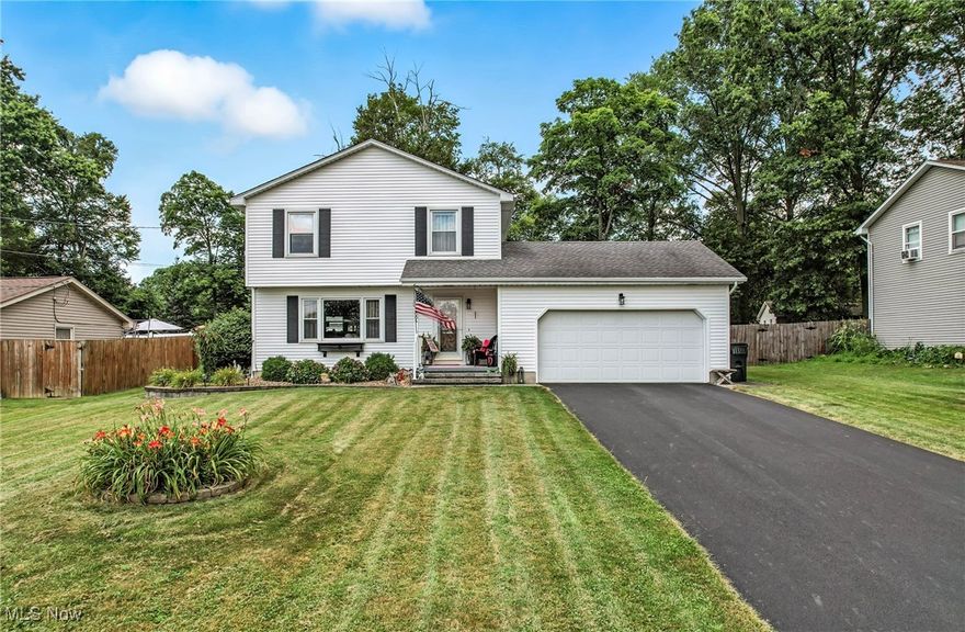 Welcome to this beautifully maintained 3-bedroom, 1.5-bath gem in a quiet neighborhood. This move-in ready home offers a perfect blend of comfort and style with a host of recent updates you'll love! Step inside to find a bright, open living space featuring beautiful hardwood floors throughout, crown moulding, and warm colors. The living room opens to the tasteful formal dining room. The kitchen offers tons of counter space and cabinet storage with a brand new stove. Get ready to relax in the family room in front of the gorgeous new stone fireplace, perfect for cozy nights in. A half bath completes the main level. Upstairs, three spacious bedrooms provide ample space for rest and relaxation, along with a full bath. Enjoy peace of mind with new central A/C, ensuring year-round comfort. Step outside to a spacious fenced-in backyard oasis featuring an above ground pool with a deck, ideal for summer fun - and a brand new shed for extra storage. The charming front porch, meticulous landscaping, and fresh driveway add great curb appeal. Located close to schools, shopping, and parks, this home offers the perfect blend of convenience and comfort. Don't miss your chance to own this updated, turn-key home with space to relax and entertain, schedule your showing today!