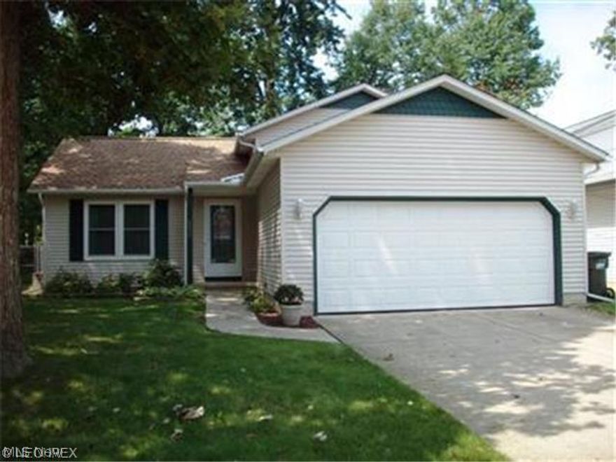 Check out this beautifully cared for contemporary Spilt Level. This home is move in condition!! 3 bedrooms and 2 full baths. The freshly painted interior and open floor plan is warm and welcoming. First floor cathedrals ceiling, skylight and gourmet oak kitchen is just the beginning. Plenty of cabinets, counter space and breakfast island make the kitchen a cooks dream. All appliances stay including the washer and dryer. Enjoy warm days on the deck overlooking the fenced yard, great for the children and pets. Numerous updates include: newer kitchen appliances, newer windows and doors, newer furnace and central air plus outside compressor 2003, H2oTank 2004, and roof, complete tear off in 2009 with a 30 year warranty. The seller is in the process of re-seeding the front yard. FHA and VA welcome.