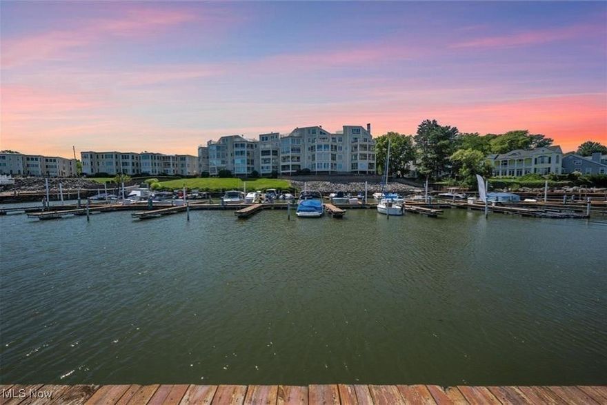 Rare lakefront end-unit condo with breathtaking views of Lake Erie! This impeccably maintained home has been beautifully renovated and offers 2 bedrooms and 2 full baths, with one bedroom on each level-ideal for privacy. The primary bedroom provides a spacious, relaxing retreat with exceptional lake views from the newly renovated balcony. The open floor plan boasts vaulted ceilings and flows into the stunning Harbor Room with three walls of windows and a wet bar, perfect for entertaining. The kitchen features stainless steel appliances and high-end finishes. A spacious mudroom houses the new furnace and A/C, a new washer and dryer, and plenty of shelving. Enjoy resort-style living with HOA amenities such as direct beachfront access, pool, fitness room, marina, tennis/pickleball courts, indoor heated garage, and a locked storage unit. On site dock rental available. A truly exceptional lakefront opportunity!