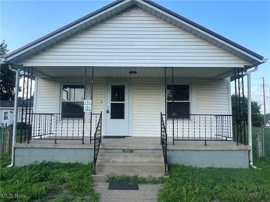 Newly renovated single-story home featuring 3 bedrooms and 1 full bath. Unfinished basement includes washer and dryer hook-ups. Kitchen equipped with new refrigerator, gas range, and microwave. Additional features include a newer metal roof, detached one car garage, rear parking, and a fenced yard. This home sits on 2 parcels, offering extra outdoor space. Move in ready.
