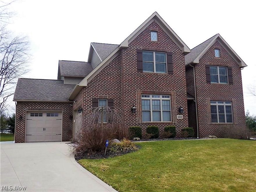 This Rembrandt Home impresses with its classic, timeless design & materials, while offering unique functionality with a contemporary layout & features designed for the modern family's ever evolving set of needs.
Classic brick front, attached 2 bay side load garage w/ 2 car main garage & separate 1 car hobby garage, includes convenient up/down access from basement to garage. 
Impressive main floor, open from end to end, with gorgeous design features, such as gleaming solid wood paneled doors, ornamental wrought iron, granite, mixed modern cabinetry, in the impressive foyer and multi functional chef's kitchen w/open formal dining, a grand living room with unique 4-way ceiling beams and gorgeous stone fireplace. Mudroom w/ample oak storage and seating, and an elegant den/office off the foyer. Guest bedroom w/window seat and full bath.
Second floor features a truly great room with cathedral ceilings and endless possibilities. 3 beds and 3 full baths, including the master suite, highligh