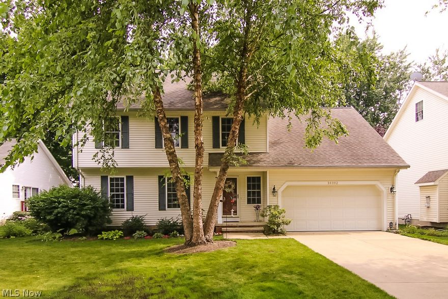 Pride of ownership! This newer built and updated colonial boasts four bedrooms and two and a half bathrooms. Do not miss the huge finished third floor - not included in the square footage! Sitting on .2 acres, this lush and wooded lot offers a serene and perfectly landscaped hideaway. Open and flowing floor plan - large, updated eat-in kitchen with newer appliances. Sliding glass doors overlooking the expansive patio and yard. Welcoming family room with gas fireplace features large windows that flood the space with natural light. Half bath and laundry on the first floor for your convenience. The second floor boasts the master suite, equipped with private bath and large walk-in closet, two other sizeable bedrooms accompanied by another full bathroom and a fourth bedroom currently being used as a family room.  You won't believe all the space! Full basement for your man-cave, children's playroom, or storage needs, it's your canvas! Two car attached garage. Enjoy the rest of your Summer an