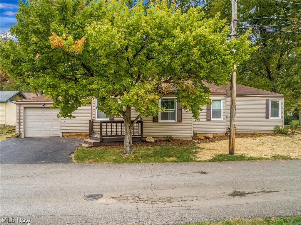 Here's a great ranch home that has some nice updates, is move-in ready and is a terrific starter home. 3 Bedroom, 2 full baths, a spacious living room with original hardwood flooring. The master bath has been added to the master bedroom by the current owners along with a nice size walk-in closet. Original hardwood floor in second bedroom and laminate floor in third bedroom which could possibly be converted to first floor laundry is desired. Includes kitchen appliances. New interior paint throughout along with a freshly painted floor and new windows and doors in enclosed porch that connects to a new 11 x 21 concrete patio.