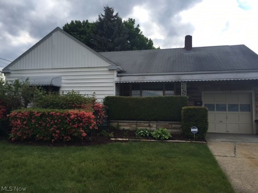 Welcome Home! Beautiful Ranch that sits on 3 city lots. This home is 2 bedrooms 2 full baths with a finished basement. All appliances stay including washer and dryer. Furnace, central air and hot water tank all newer 2008. Hardwood floors under the carpet on the main floor and wood burning fireplace in living room. This home is close to everything; school across the street/ shopping/ freeway.  Tons of storage in the basement with laundry area, full bath done in 2010, workshop area and additional storage room.