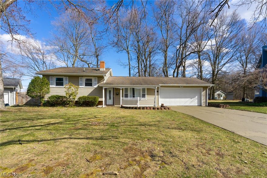 Come see this beautiful 3 bedroom home in Canfield Schools.   This home is located on a cul-de-sac and is freshly painted with new carpet.  The kitchen has granite counter tops, glass tile back splash and new flooring.  The stainless steel appliances stay.  The lower level is a great family room or rec room.  The backyard has a cement patio.