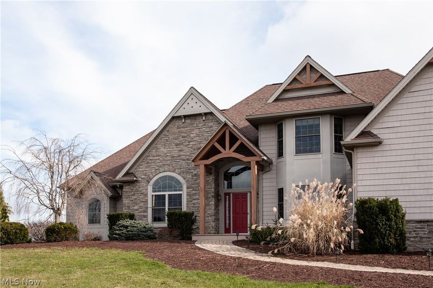 Stunning custom built, one owner home on 2 parcels totaling 10 acres with 5,000 sq ft outbuilding!  This 4, possible 5 bedroom home with 6 bathrooms welcomes you with lots of natural light and HWF throughout.  Large kitchen with granite countertops and newer appliances that stay.  2 story living room with fireplace.  First floor master suite with unique walk-in shower w/dual shower heads & double vanity.  Dining room, bonus/office room, laundry room and 2 half baths complete the first floor.  2 bedrooms each with en suite on 2nd floor, plus bonus room.  Full, finished walk-out basement above grade with wet bar, wine fridge and additional bedroom suite.  TONS of storage.  3 car attached garage.  This home is a must see!  Extremely clean, well built, truly move-in ready.  A beautiful home for living and entertaining.  Pool table and safe in basement stay.