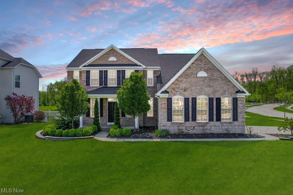 Newly built in 2016, in the Highland school district this colonial home in Wadsworth is on a corner lot. Immaculate landscaping gives you curb appeal from both sides of the streets. This home has over 2800 sq. ft. of above ground living. Enter your new home you are greeted with a beautiful foyer that is open to your staircase leading to the 2nd floor. Painted in neutral colors throughout and the windows give you natural lighting for the sun to shine through. The family room features a fireplace and is open to the kitchen with recessed lighting. The dark cabinetry in the eat-in kitchen makes your countertops pop. You will have plenty of room with all the cupboard space to store your kitchen items. A kitchen island adds more prep space for the perfect baker with outlets. Sliding doors lead you to your backyard. The dining room has Tres ceiling and flows to what could be used as an office space. Laundry room and a powder room complete the 1st floor. Upstairs you have an on suite with room