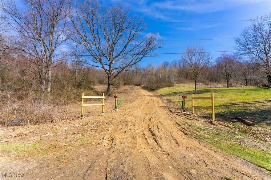 Vacant Land ....they aren't making any more of it!  Welcome to this 21 acre lot with endless opportunities! This is the perfect place for a great escape to peace! Columbiana Co, Beaver Local Schools, Madison Twp.  This parcel offers over 220' of road frontage that then it can open up to all your ideas.  You can build a home at the lower lot close to the road if you choose, or you can go to the top of the driveway to the large open field to build your dream home, have a little cabin for your private hunting property (there have been deer harvested from this property) or this is the perfect place for recreation and play.  This land has had some improvements done:  One small driveway near the lower lot has gravel.  Or the long driveway that leads up to the top open field. There is an electric pole at the road. Also, the property has an artesian well and septic (conditions are unknown) Mineral rights are negotiable.  This land is perfect for residential building, hunting or riding ATV.  The property is close to Beaver Creek State Park and minutes to Rt 11.  Contact us today for your private showing & turn your dreams into a reality!  You must have approved showing with an agent. Do not walk the property unaccompanied, please.