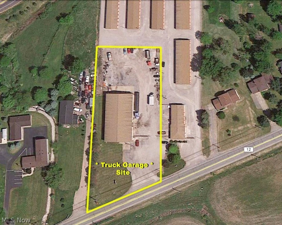 "Building For Lease at $3,100 per month." Carlisle Twp. Interstate 20 and 301. 7680 sq. ft. building. 20 ft ceiling height. 65x46 heated repair area. 65x75 unheated area large enough to park 2 semi's w/trailers. 2 offices. 2 bathrooms. Three 16x18 doors. One 12x18 door. All w/openers. Storage Room above office. 8 in concrete floor w/drain. 2 gas heaters. City water. Septic system. Fenced area. Easy access off Interstate. Also available for Sale. Agent is owner.