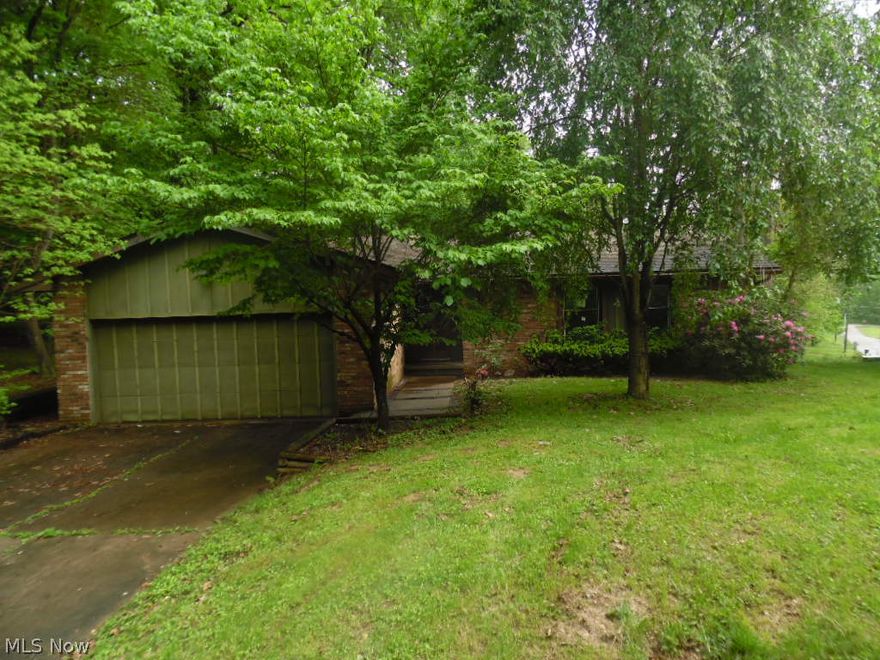 Must See!! This 3 bed and 2 bathroom home. Located at the north end of Zanesville and is surrounded by a wooded area. Has a 2 car attached garage and concrete driveway. Home was updated in 2008. Has a Large open living room with a fireplace to help enjoy the cool days. A nice full basement that can be finished to add more rooms to the home.