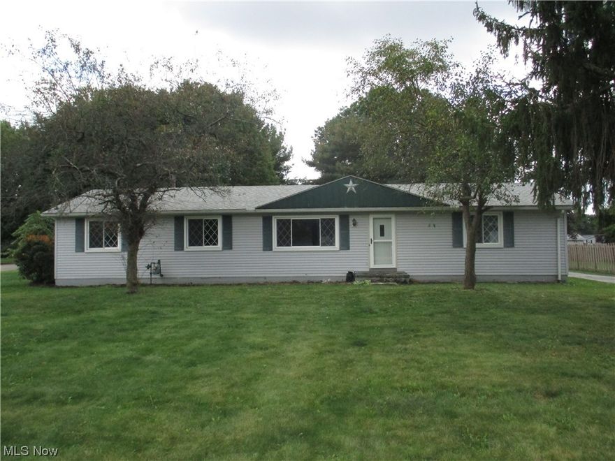 Welcome to 3704 Cain St NW. This 3 bedroom ranch is in North Canton School District but is in Lake Township. Home features new wood flooring throughout the first floor.  Other first floor updates include lighting fixtures in most rooms, bathroom sink, vanity, and toilet. New backsplash and countertop in the kitchen. The refrigerator and stove are brand new. There is an enclosed back porch and the lower level is partially finished. The flooring in the garage was re-poured within the last year. Very large backyard. Agent is related to the seller