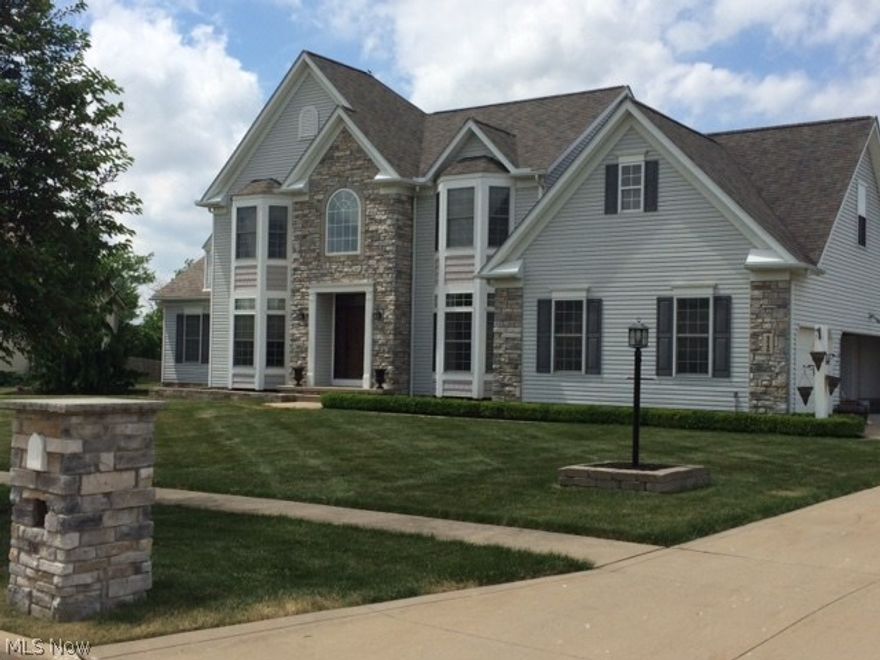 Stately 4 bedrm, 4.5 bath meticulously kept Colonial. Large vaulted great rm w/gas fireplace, open & airy. Remodeled kitchen w/tons of cabinets, granite countertops & stainless appliances that opens to a light & bright breakfast rm that overlooks the property. Formal dining rm, office, utility rm, bonus rm w/built-in desk & half bath highlight the 1st floor. The open 2-story foyer leads you to the 2nd floor where you find 4 spacious bedrms. The vaulted master bedrm has new carpeting & remodeled bathrm w/ceramic tile & granite accents. The 4th bedrm has its own full bath, perfect for a teen or guest stay. The owner spared no expense on the finished lower level. There is a theatre area with 70 inch television & chairs. There is a lighted open area for the pool player. The full wet bar has to be seen as words cannot describe the attention to detail & craftsmanship. There is a full bath w/ceramic tile shower that boasts multiple shower heads & steamer. The lower level has new carpet & plen