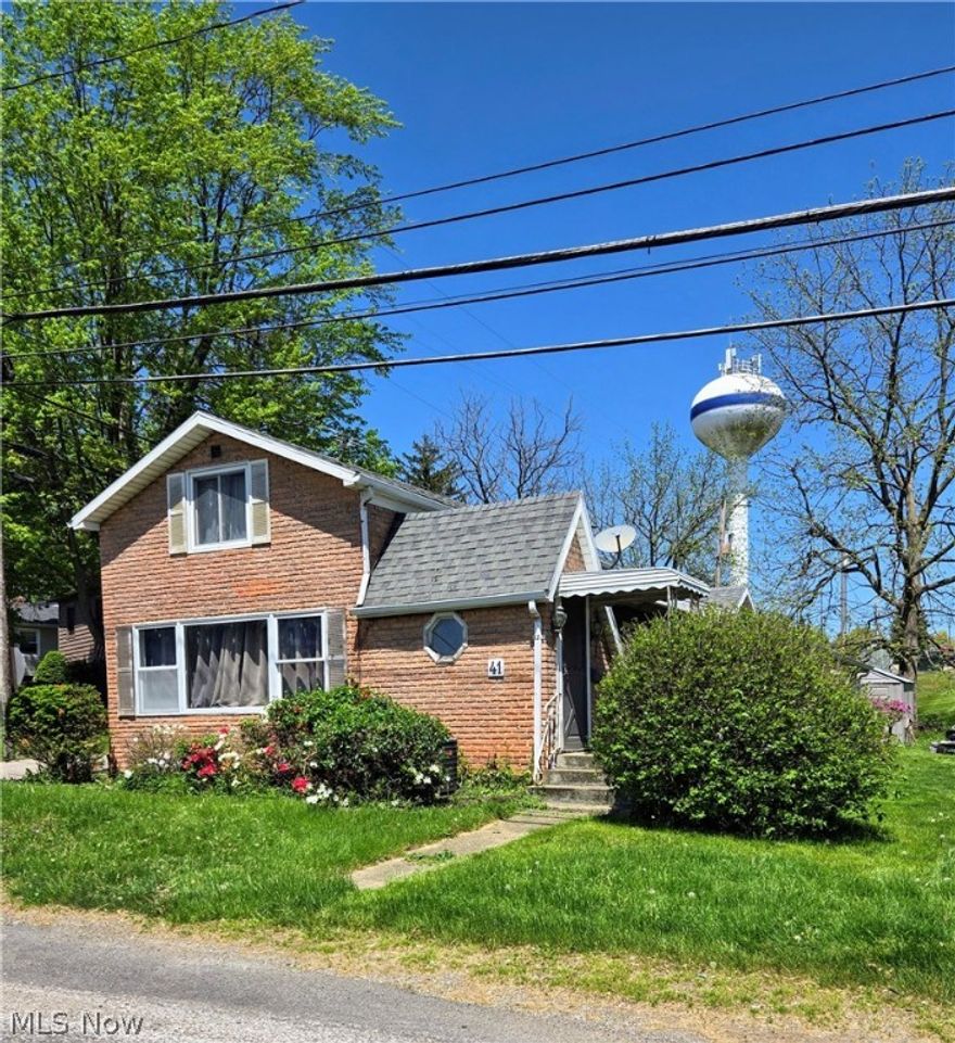 Welcome to 41 Cleveland Ave.  This home is bigger than it looks from the street and has loads of storage.  It has a nice sized living room, dining room and first floor bedroom.  The main level also has an additional back room with endless possibilities.  The upstairs consists of 2 generous bedrooms, a large closet and landing with more storage that would be perfect for a desk or play area.    The basement has high block walls with one side carpeted and the other side offering great storage.   A large covered porch overlooks the yard which contains a storage shed and off street parking.  Bring your finishing touches and make it yours today!
