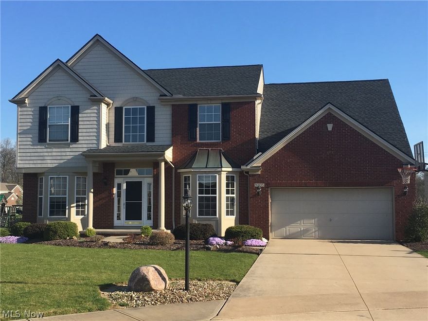 Spacious 4 bedroom brick colonial, located in Woodgate Farms, is now available.  This cul-de-sac home offers an open living space to include an eat-in kitchen and family room while still providing a more private living room plus great dining space when needed.  Upstairs you will find a large master bedroom suite with vaulted ceilings, double vanity, soaking tub and walk-in closet.  The second floor is completed with three ample sized bedrooms and an additional full bath.  Outside you will enjoy a large stamped concrete patio that overlooks a great yard maintained with a 10-zone sprinkler system.  If you find you need even more space, the full basement is ready for you to finish with a future bath already rough plumbed.  Appliances and window treatments will remain with the home.