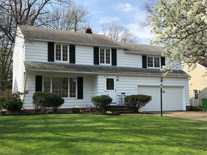 Bright and spacious rooms make this classic white Colonial home a standout in this convenient South Euclid neighborhood.  Living Room with hardwood floors and oversized Pella double pane windows.  Dining Room features hardwood floors and built in china/serve ware cabinet.  Large Eat-in Kitchen connects to a dramatic Family Room with vaulted ceiling, brick fireplace and gleaming peg and plank hardwood floor.   
 
Large sliding glass doors provide access to the rear Patio and private fenced yard with a curving pathway to an oversized Deck seating area.  Back inside a Half Bathroom is located near attached 2-car garage entry and stairs to basement recreation room.
 
The second floor boast 4 Bedrooms including an oversized Master Bedroom with private full Bathroom as well as 3 additional family Bedrooms and hall full Bathroom.  Bedrooms all have hardwood floors. All through the home and rooms you see signs of a well maintained and lovingly cared for home.  
 
One of many well maintai