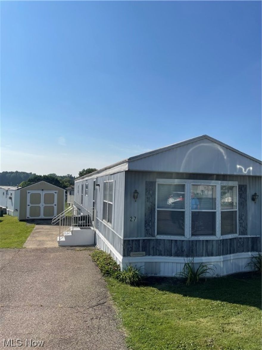 Immaculate, manufactured home! Good opportunity for small family or anyone wanting to downsize. Newer carpet, bathroom, flooring, A/C, shed, and water tank!