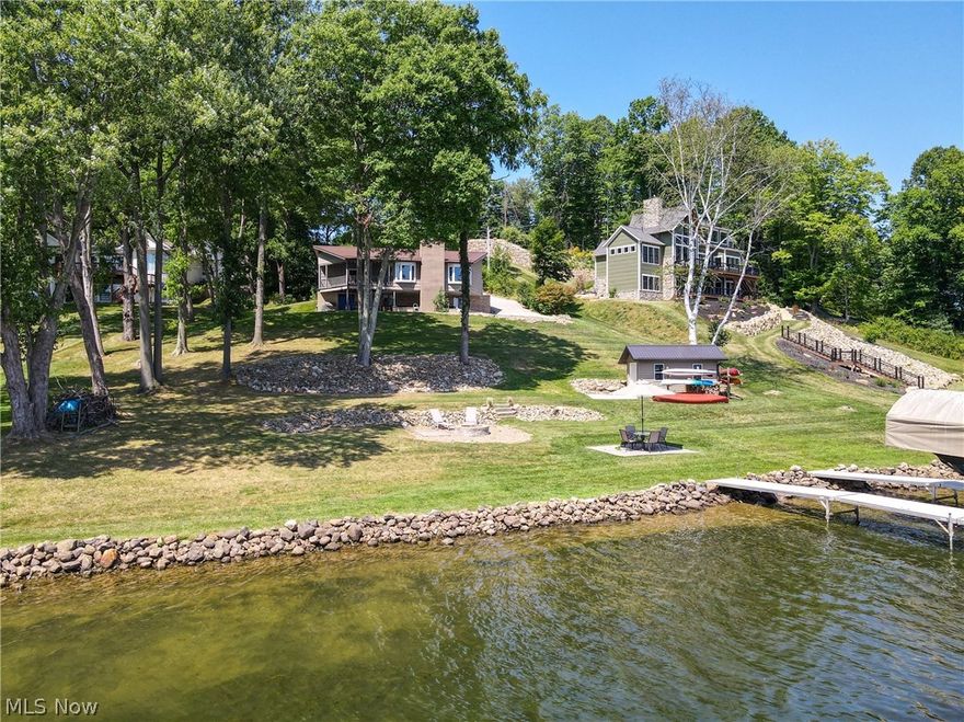 This is lake front living at its best!!  Panoramic lake views and 163 feet of water frontage, this is an opportunity you don't want to miss!  Cathedral ceilings in the living room along with bay windows and a gas fireplace.  Large eat in kitchen that walks out onto a covered deck. The perfect spot to eat and unwind!  Main bedroom with a bathroom along with 2 other spacious bedrooms and a full bath on the main floor.  The lower lever has a ton a space that could be finished off.  There is a 4th bedroom or family room, large full bath along with a kitchenette.  The lower lever walks out onto a large covered patio with a wood burning fireplace.  The perfect space for entertaining!  Nice size shed by the lake for all your storage needs.  There aren't too many properties at Lake Mohawk with this much water frontage, so don't miss out on this great opportunity!  Lake Mohawk is a private, gated community consisting of a 500 acre lake with unlimited horse power.  3 beaches, marina, tennis courts, sand volleyball and a 9 hole golf course.