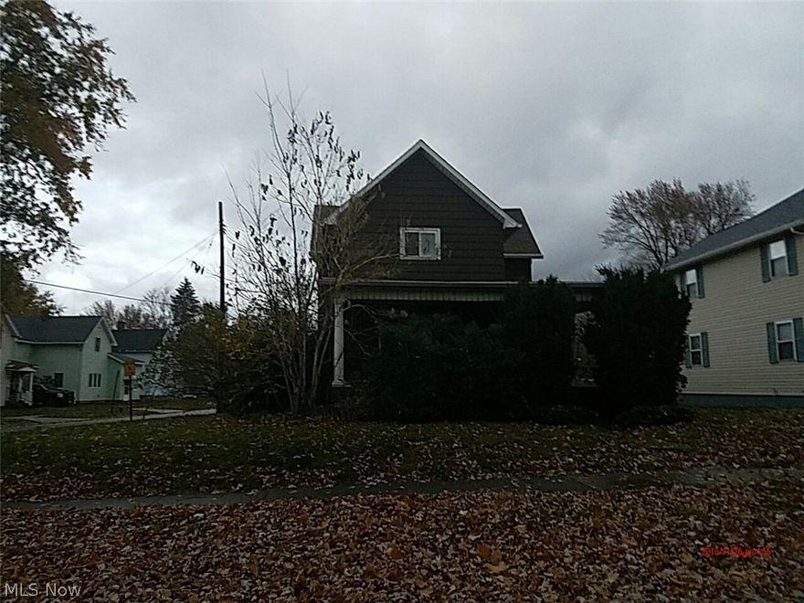 3 bedroom colonial with eat in kitchen, big family room , full basement and detached 2 car garage on a corner lot