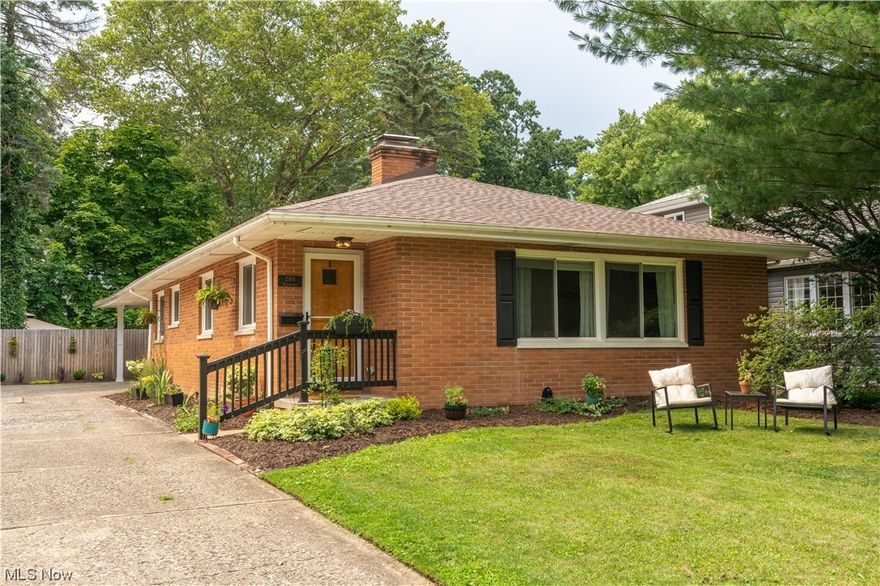 Welcome home to the heart of West Akron's Castle Park neighborhood. This cozy brick ranch 2 bedroom 2 full bathroom home has been well maintained and cared for, ready to move right in! Walk into the spacious living room with a wood-burning fireplace leading into the dining room and kitchen. The updated eat-in kitchen has newer stainless steel appliances, ample storage space, and beautiful granite countertops! Both bedrooms are generously sized with original hardwood floors. and an updated full bath on the main level. The basement is partially finished with an additional fireplace, featuring two large finished rooms one with the potential to be a third bedroom + a closet. Schedule your private showing today to make this home your own.  The home was been freshly painted in July 2023.   The exterior backyard had a French drain installed in 2020.