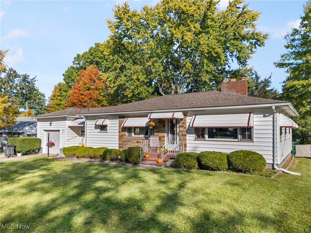 Welcome to this charming ranch-style home in Akron, where comfort meets convenience! Step inside to discover an open kitchen with ample counter space, stainless steel appliances, and room to entertain. Cozy up to the wood-burning fireplace in the spacious living area, with firewood included to get you started. Newer LVP flooring runs throughout the main living spaces, while the two large bedrooms feature original hardwood floors and plenty of closet space.
The full basement offers additional living space and a second full bathroom, perfect for added convenience. Outside, enjoy the fully fenced backyard from the comfort of the screened-in porch. The attached one-car garage with a breezeway provides extra storage and a functional entryway.
This home has everything you need—schedule your showing today! Home warranty included!