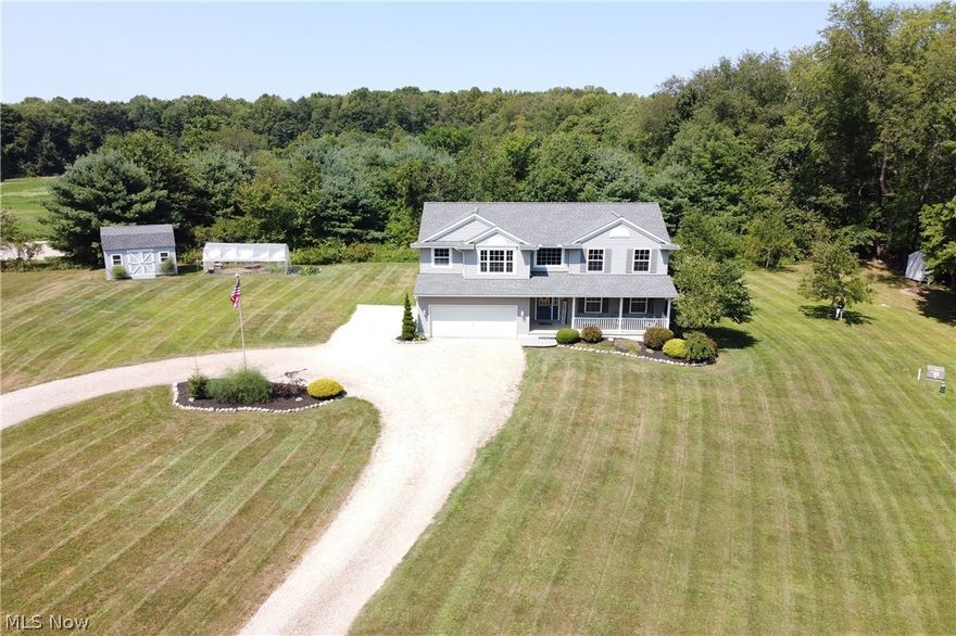 Nestled on nearly 3 acres of secluded land, this stunning home offers a perfect blend of tranquility and modern living. Featuring 4 oversized bedrooms, all with walk-in closets with one located on the first floor. Also featured; 2.5 baths, a finished basement complete with a convenient laundry area, this property is designed for comfort and convenience. The sellers have meticulously landscaped the lot, creating beautiful trails in the woods with a tree stand for wildlife observation. Lovely Deck and Front Porch for relaxation. Additional outdoor amenities include an Archery target shed, All purpose shed for equipment storage, a greenhouse, and a variety of fruit-bearing trees, grapevines, you can sneak in some berries along the tree line. The home boasts a newly installed 2023 roof and even includes appliances along with a chest freezer in the basement and a drinking fountain in the garage. This is an exceptional opportunity to enjoy a private, peaceful, nature-filled lifestyle while still having all the modern comforts. Don’t Delay, Call Today!