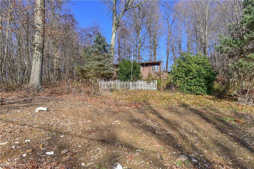 Ranch Mobile Home on .24 Acre Lot with View of Guilford Lake.  Home Features Include:  Kitchen, Family Room, & Bedrooms.