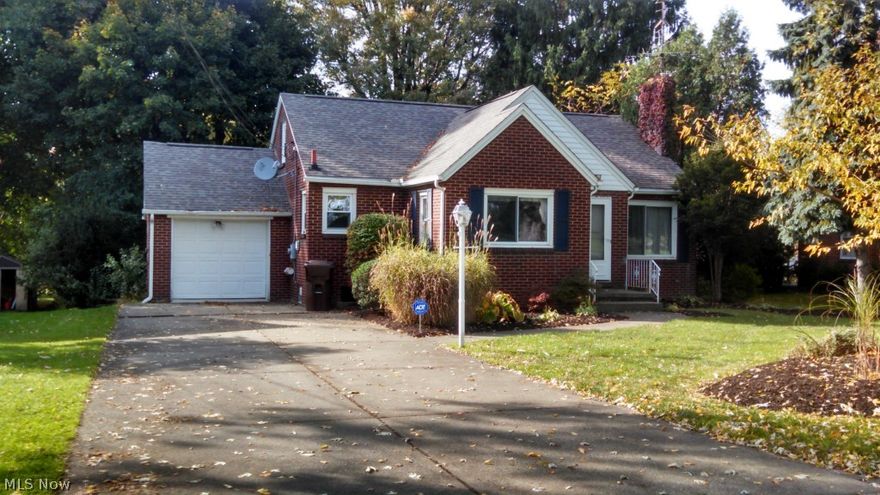 Wonderful home and location at a great price!
 Foyer entry ( with closet ) into the large living room with fireplace surrounded by custom cabinetry. Sunny dining room accessible to living room and kitchen. Kitchen has upgraded solid surface countertops & corner double stainless steel sink with lovely view from the windows.

Upgrades include finished 2nd floor ( 3rd bedroom ),  carpet, laminated floors, basement kitchen custom cabinets and solid surface countertops ( plumbing not connected ) and remodeled rec room  ( partially finished ), large room has roughed in plumbing for bathroom , newer furnace, hot water heater, 150 amp electric, most newer windows plus some glass block basement windows and main bath has replaced tub surround.

Seller excluding shelf on the wall above the basement kitchen cabinets & sink area, has great sentimental value.