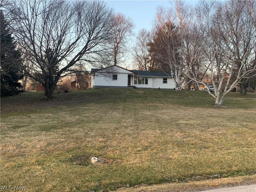 Charming single family ranch style home sitting on a corner 1.4664 lot. Features 3 bedrooms and 2 full baths. The master bedroom offers a full bath. The home offers a full basement with tons of potential, office recreation room, work shop and plenty of storage it also walks out to the back side yard. This house is nestled in the Nordonia Hills Community. 

Home features a newer roof 2018- with a transferable warranty, Brand New Hot Water Tank, the home is well, but the street is ran for water- Tying in is an option. 

Lot 392 Front x 237 w x 60 x 218 rear