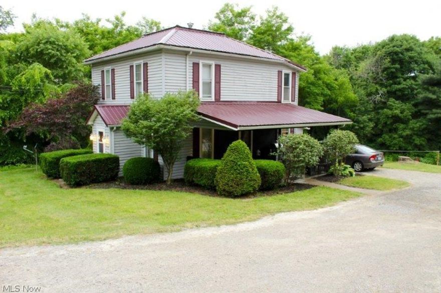 Large enough for a horse, close enough to town for public water and sewer. Spread out over .676 acre this  4 BR home is move-in ready. From the metal roof, newer furnace and main floor master bedroom, to the tastefully decorated living room and spacious kitchen this home features a lot for the price.